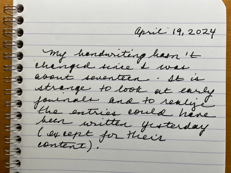 Cursive journal entry on lined notebook paper
